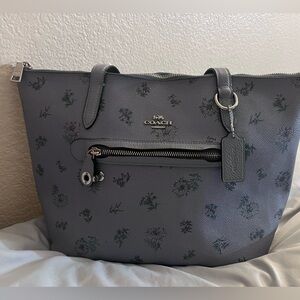 COACH TAYLOR TOTE BLUE with flowers print design.